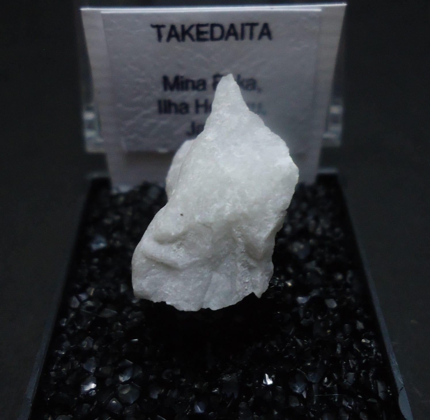 Takedaite mineral