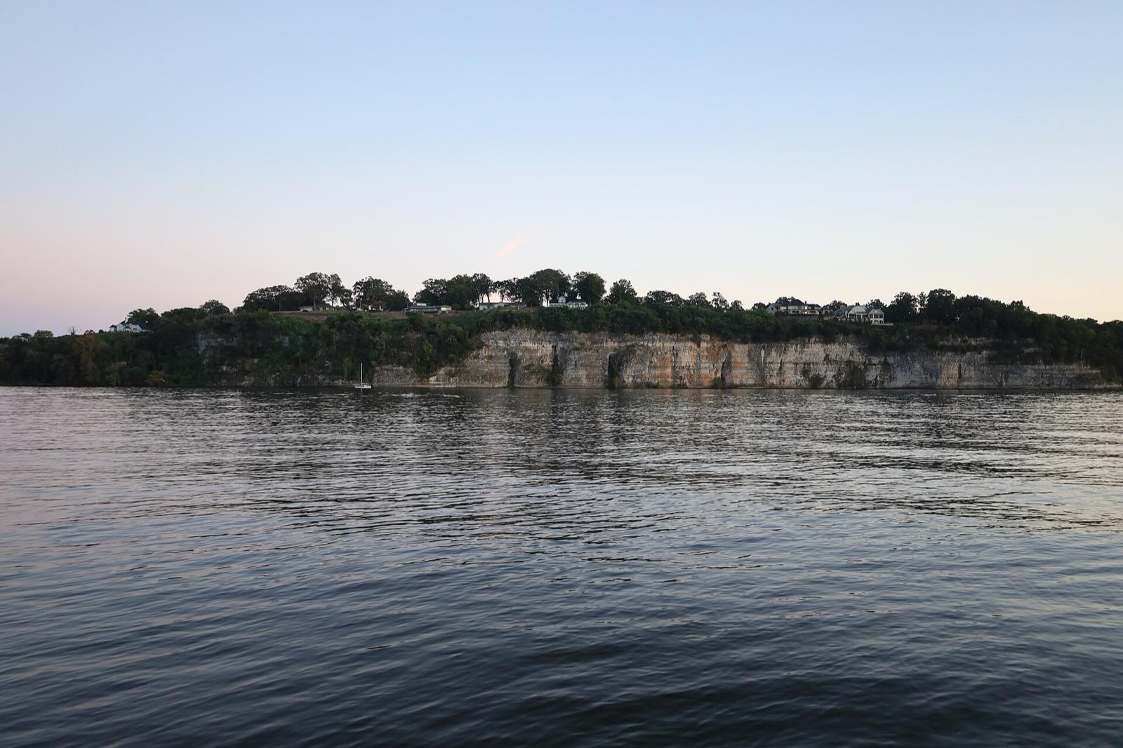 A pale Paleozoic limestone bluff along the Tennessee River at Florence, next to Muscle Shoals, Alabama
