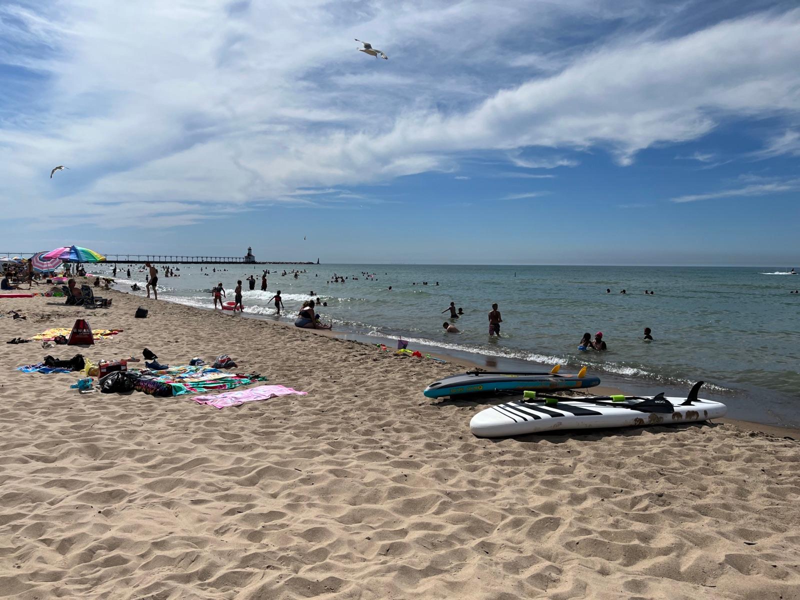 Washington Park Beach on Lake Michigan at Michigan City, with the East Pierhead Light in the distance, LaPorte County, Indiana.