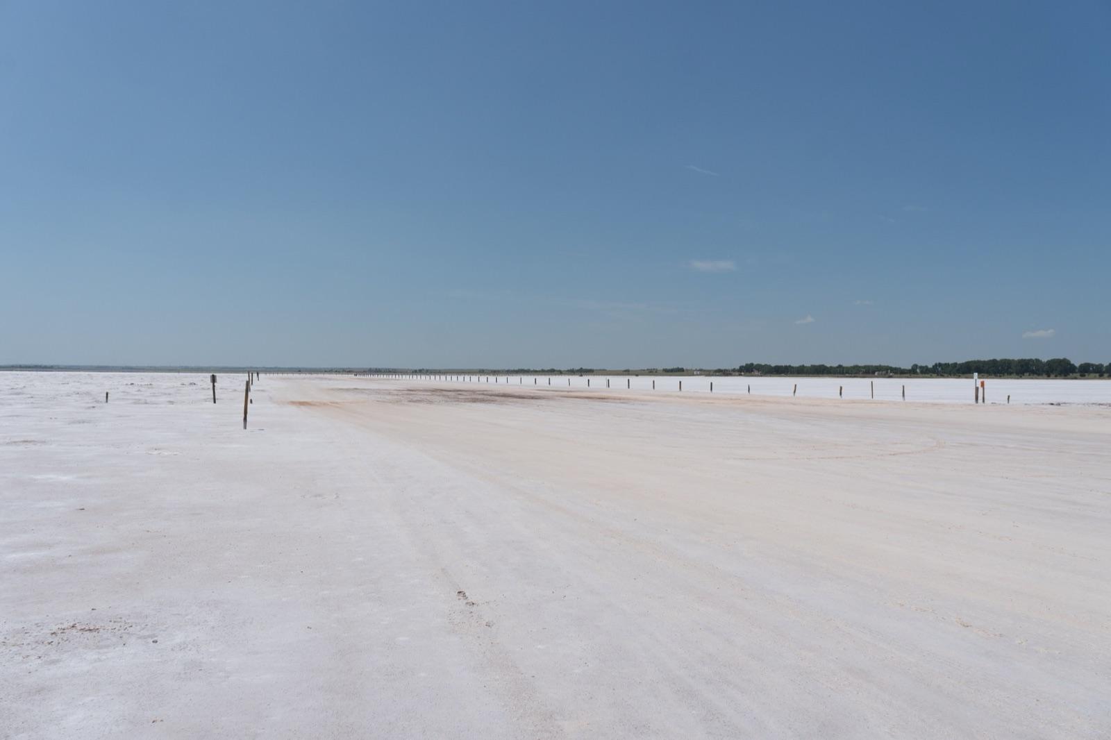 The white salt flat and marked crystal-digging area at Salt Plains National Wildlife Refuge, Alfalfa County, Oklahoma