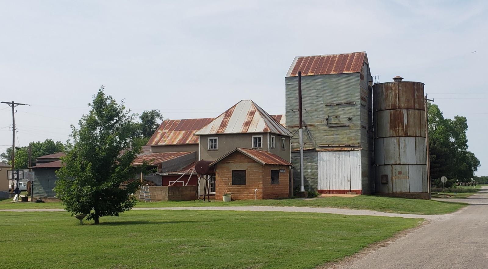 The historic Seiling Milling Company grain elevator in Seiling, Dewey County, Oklahoma; a town landmark in the region's agate and gravel country