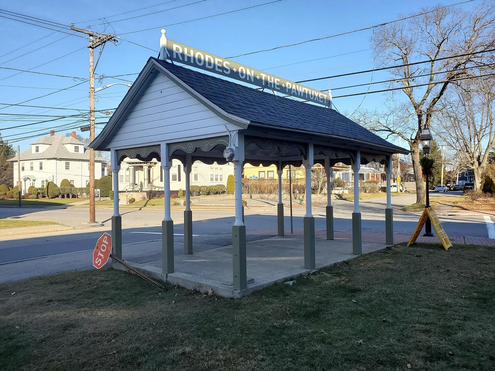 The historic Rhodes-on-the-Pawtuxet pavilion in Pawtuxet Village, Cranston, Rhode Island; pebble collecting is along the nearby Narragansett Bay shore.