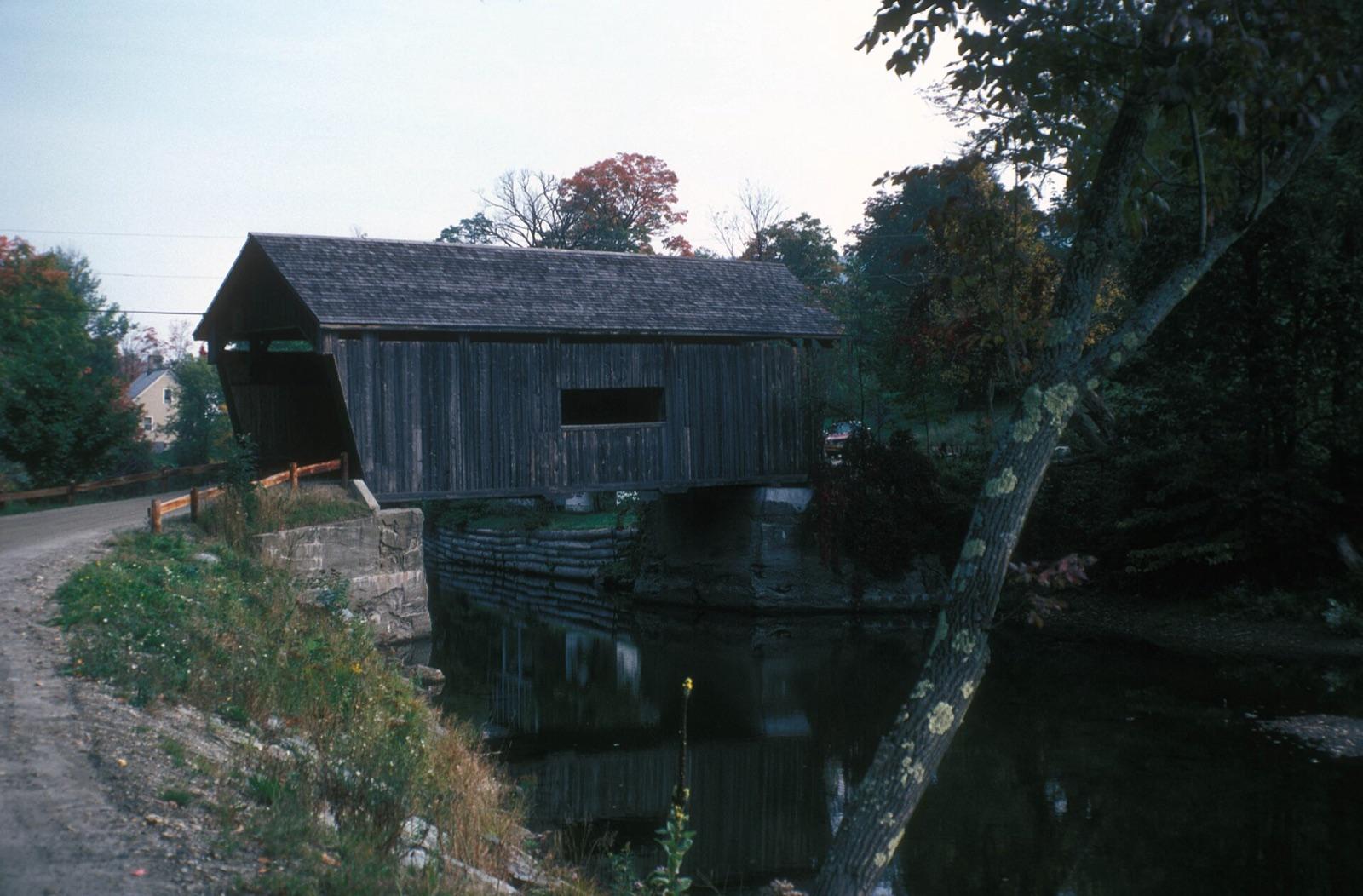 The Warren covered bridge over the Mad River, a placer-gold stream in the Mad River Valley, Warren, Washington County, Vermont.