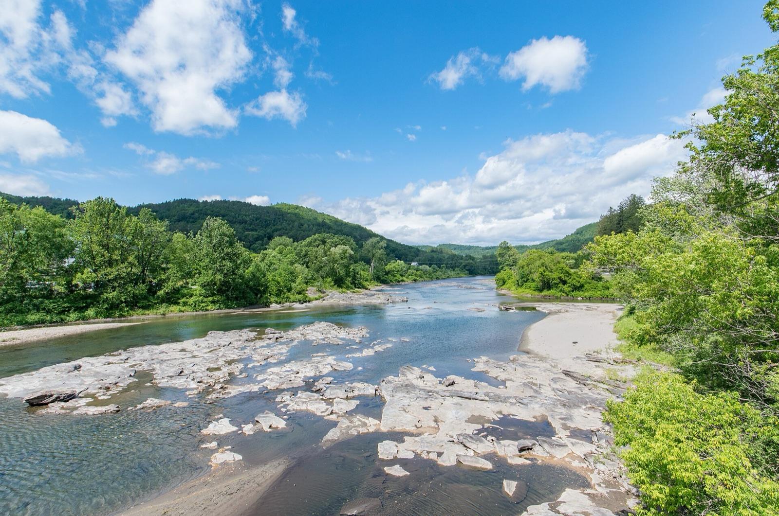 Gravel bars and bedrock ledges of the White River at South Royalton, downstream of the Bethel placer-gold reach, Vermont.