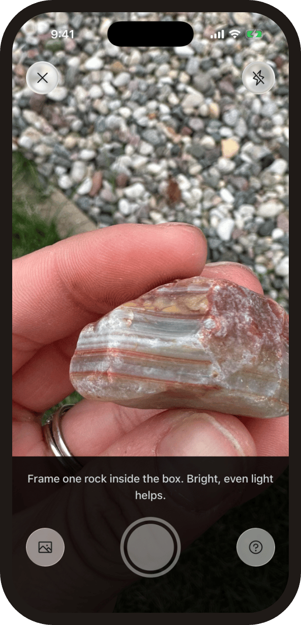 RockHoundR rock identifier camera pointing at a banded agate held in a hand