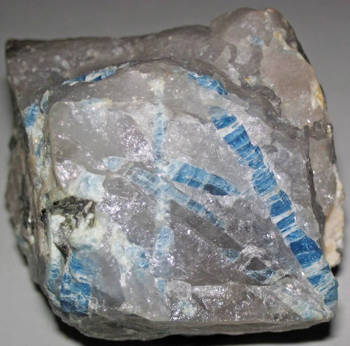 Aquamarine prisms locked in pegmatite, as found before trimming