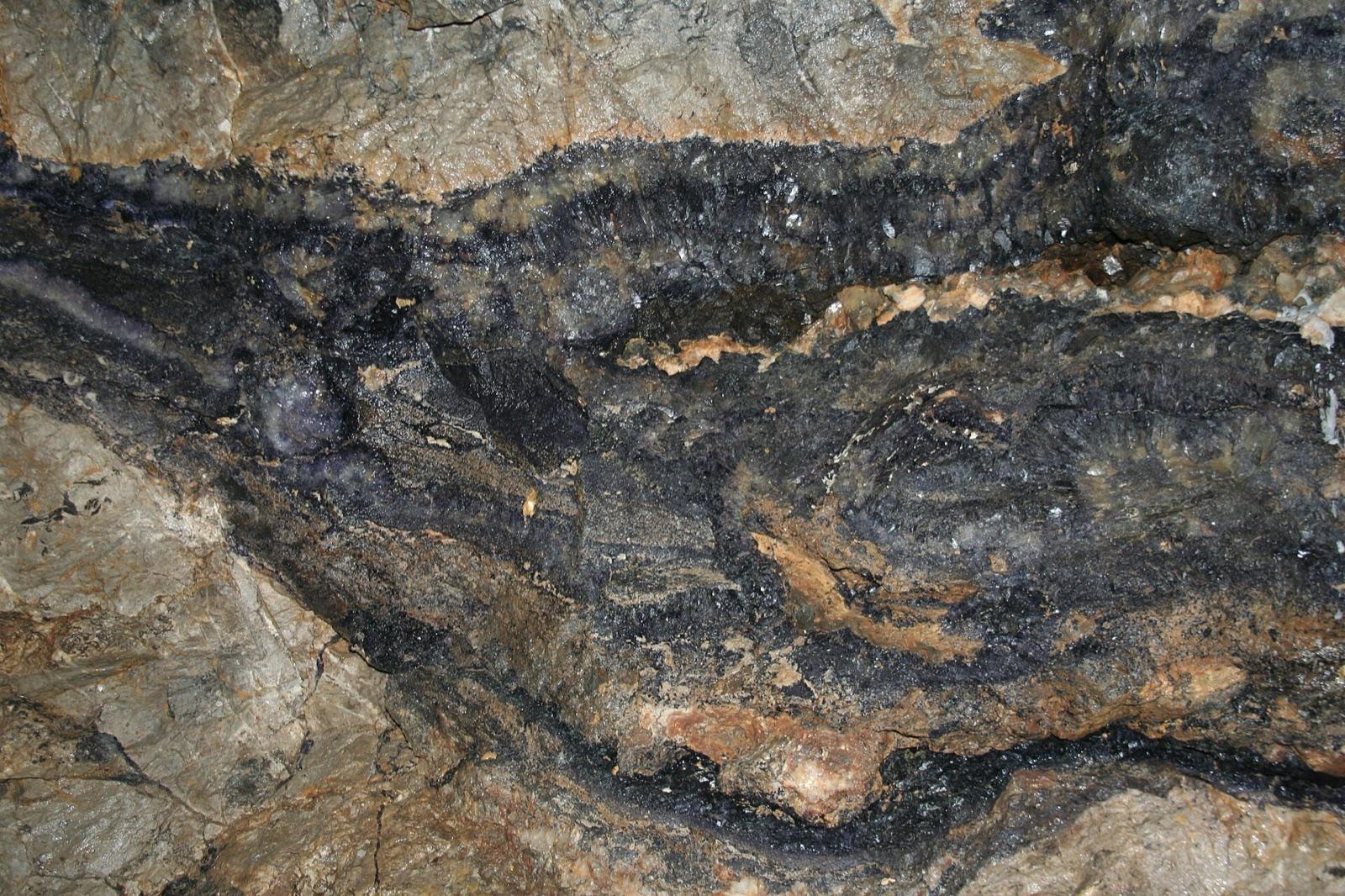Vein of Blue John fluorite in the Witch's Cave, Treak Cliff Cavern, Derbyshire