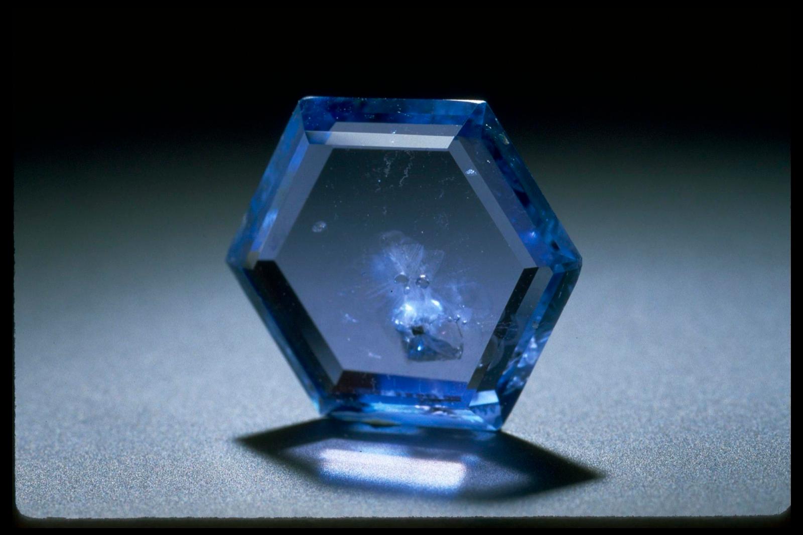 Blue Yogo sapphire cut as a flat hexagon, Yogo Gulch, Montana