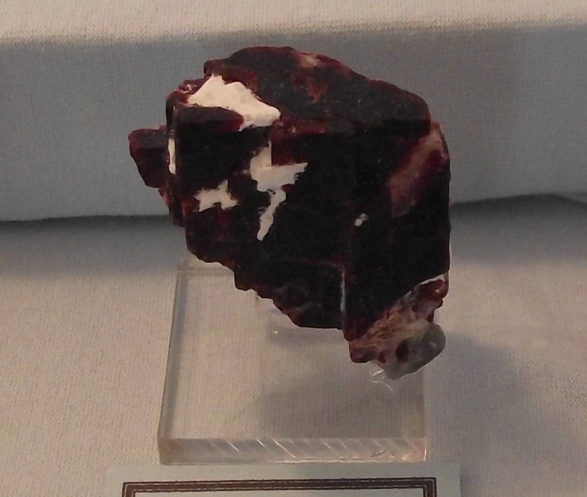 Dark carmine villiaumite cleavage block, Kola Peninsula