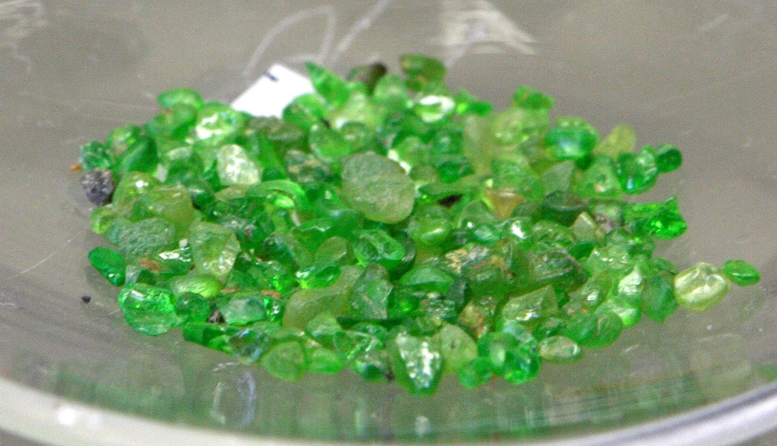 Loose bright green demantoid garnets, Mineralogisches Museum Bonn