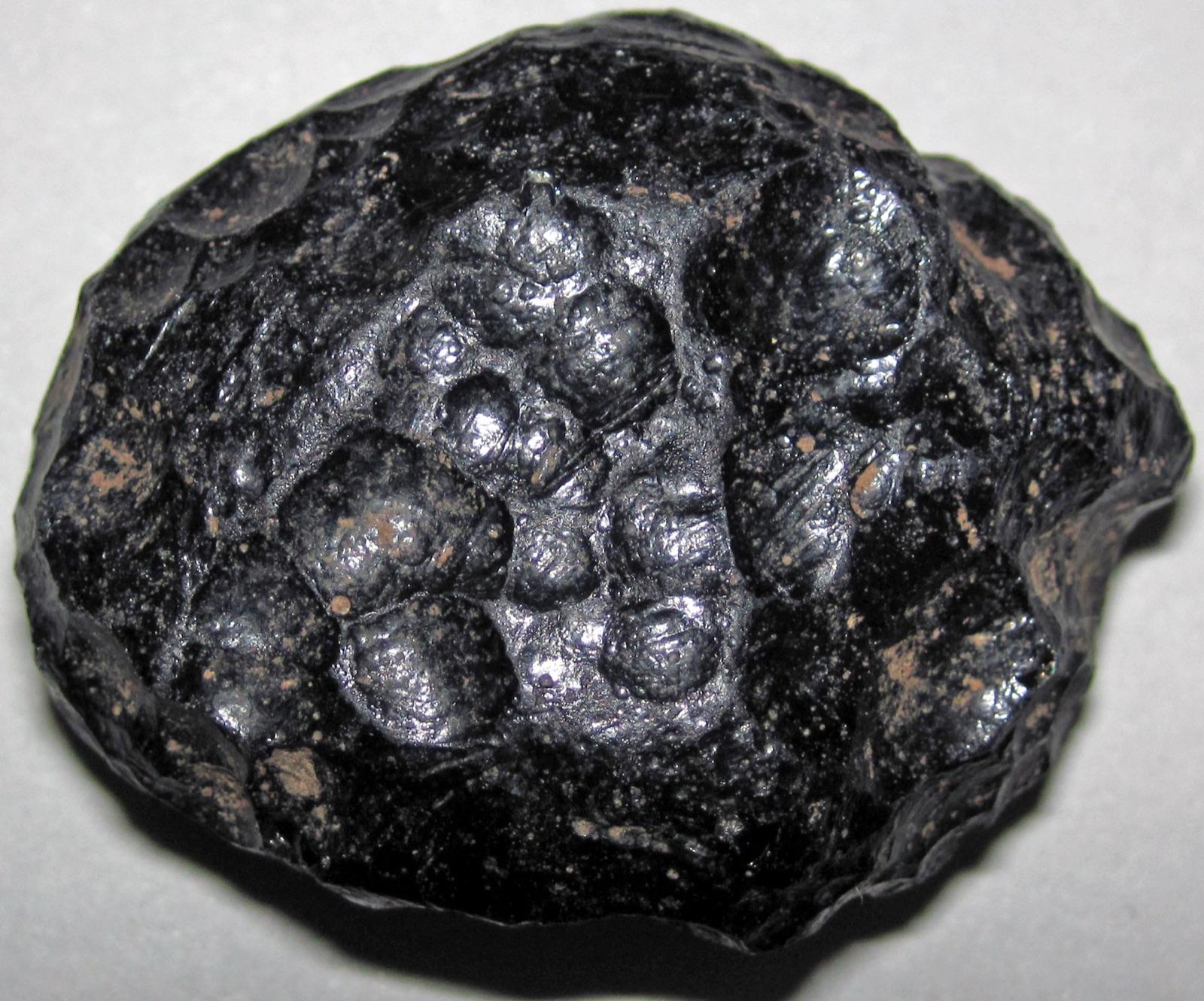 Indochinite tektite from the Australasian strewn field with pitted glassy surface