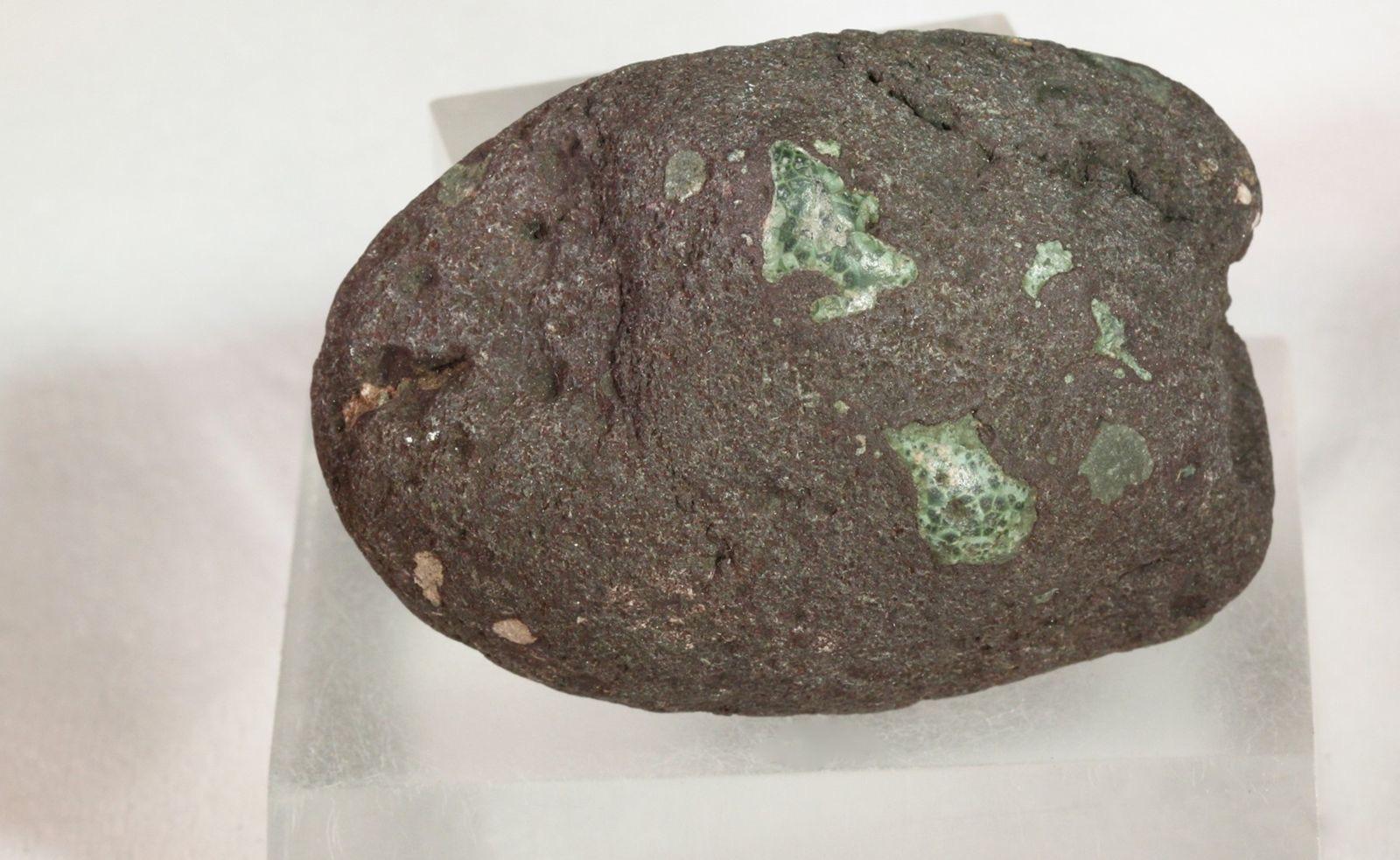 Basalt pebble with green greenstone amygdules from Rock Harbor, Isle Royale, Michigan