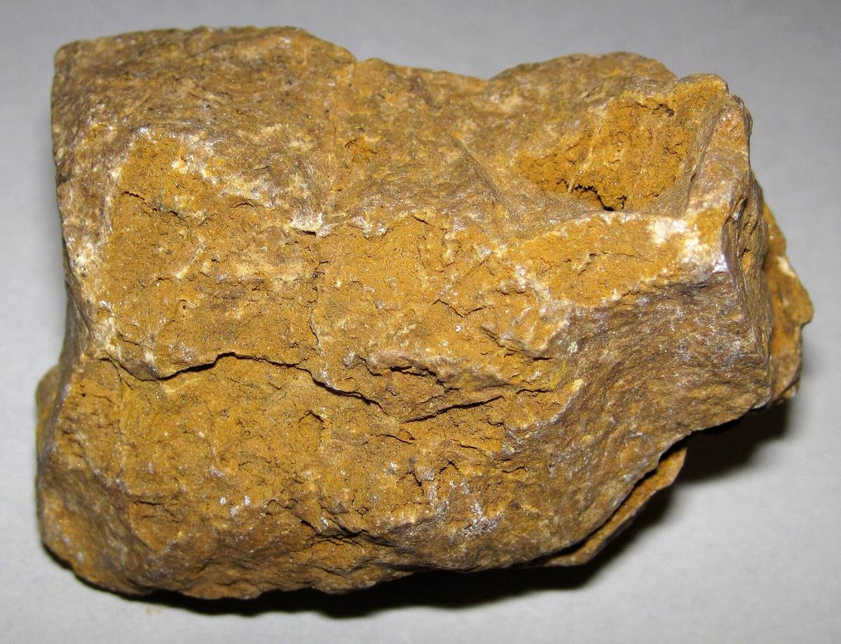 Massive ochre-brown limonite hand sample