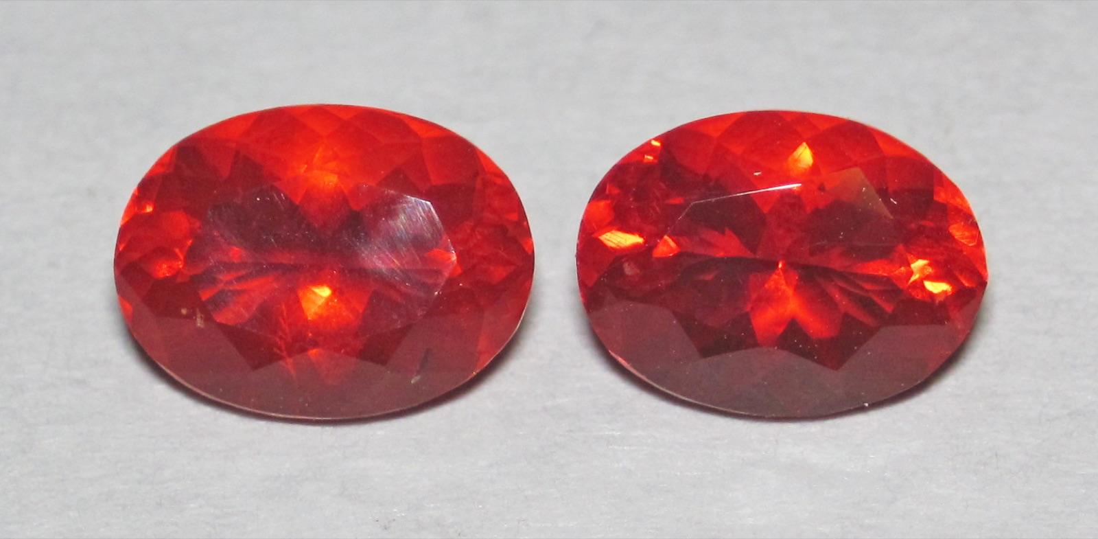 Two faceted orange-red fire opals from Mexico