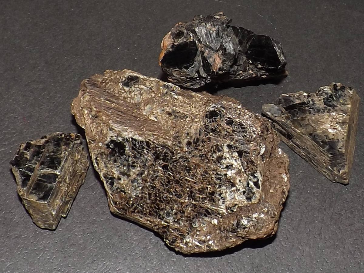 Blackish-green mica cleavage pieces