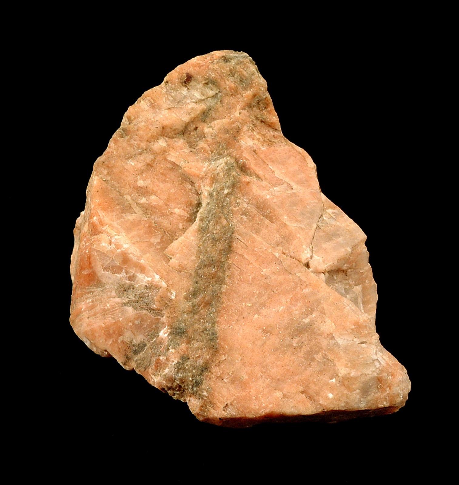 Pink perthite feldspar with streaky exsolution texture