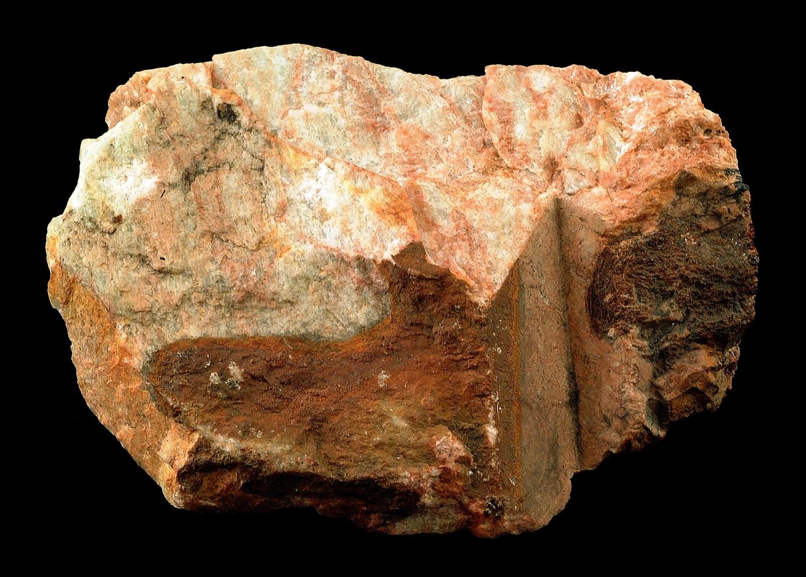 Perthite feldspar with pink and white intergrown bands