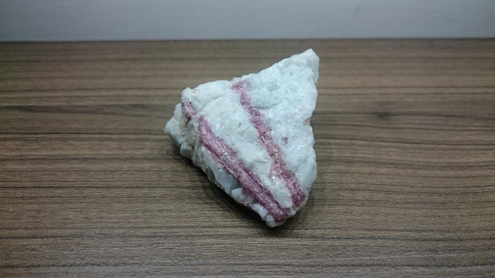 Pink tourmaline crystals in white quartz