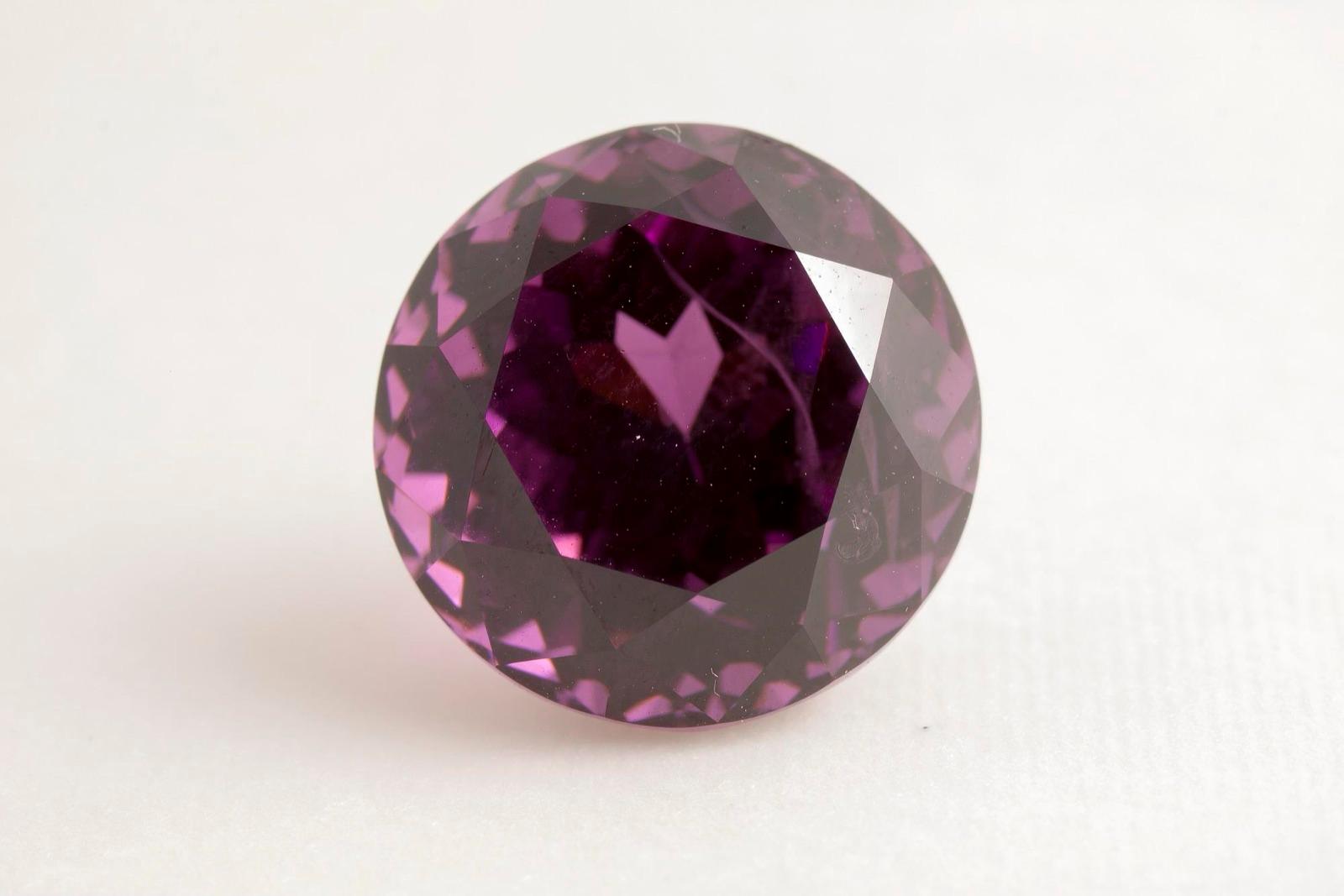 Round purple rhodolite garnet from Sri Lanka