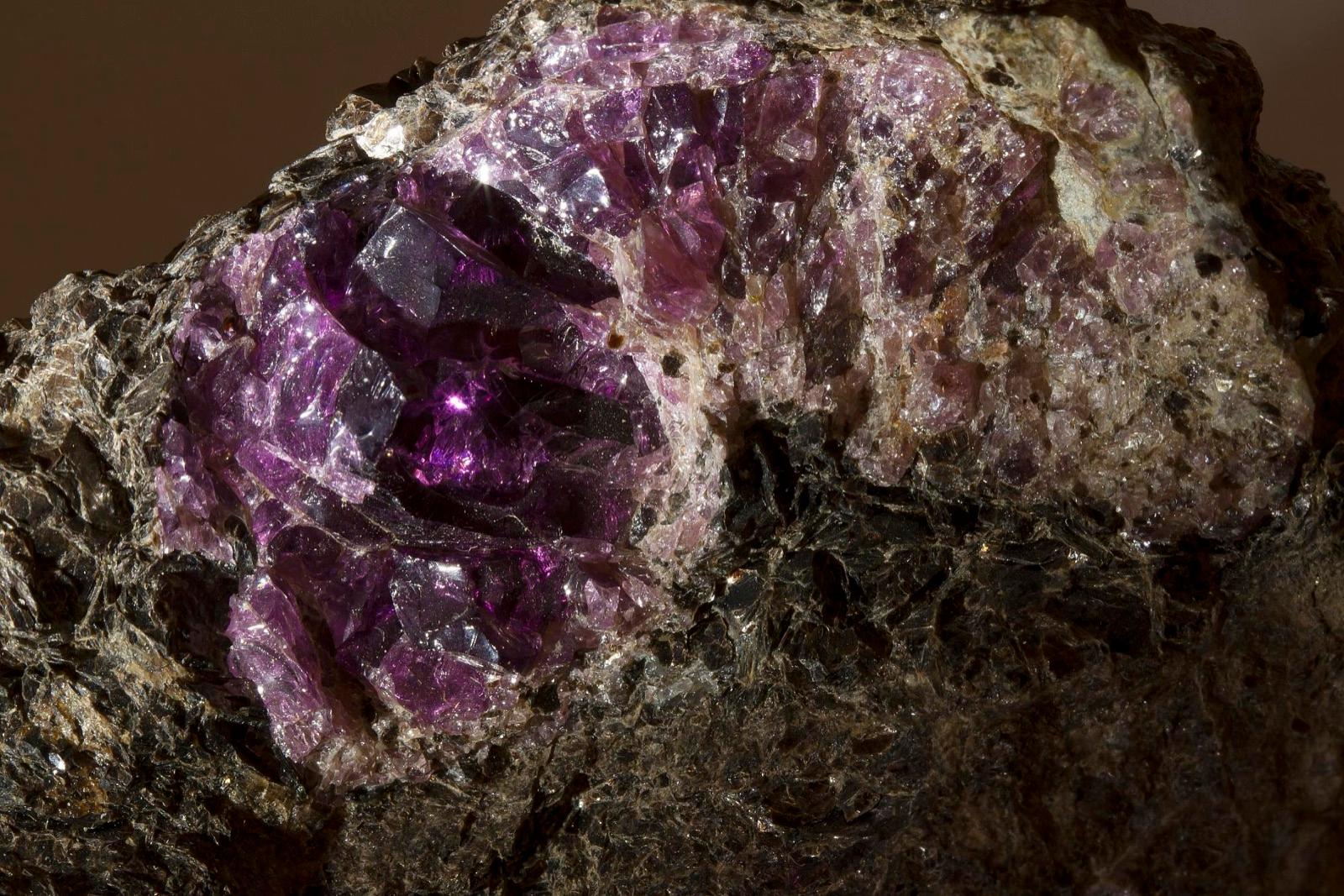 Purple pyrope garnet in dark rock matrix from North Carolina