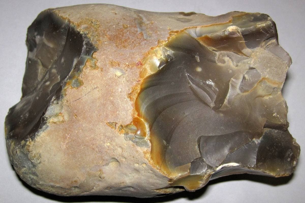 Whole quartz-chert nodule with tan cortex and broken faces