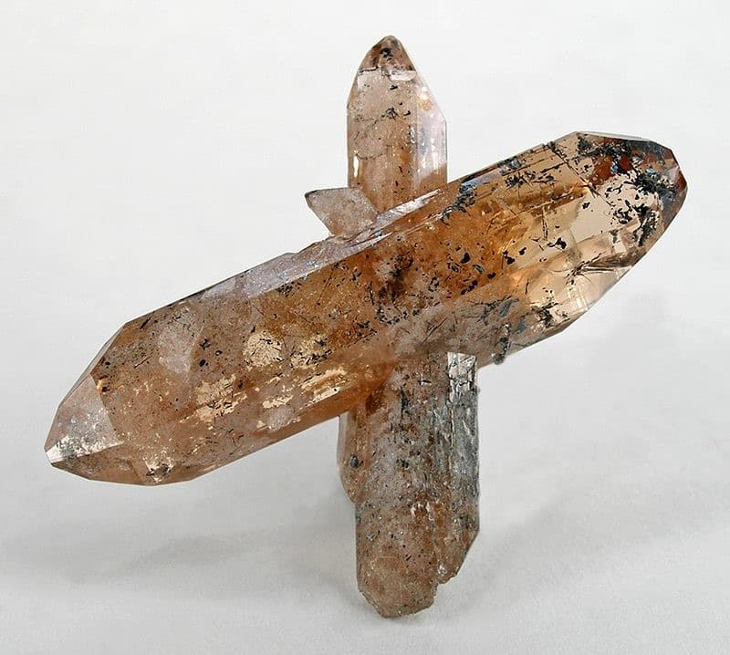 Sherry-colored topaz crystals with hematite from Topaz Mountain, Thomas Range, Utah