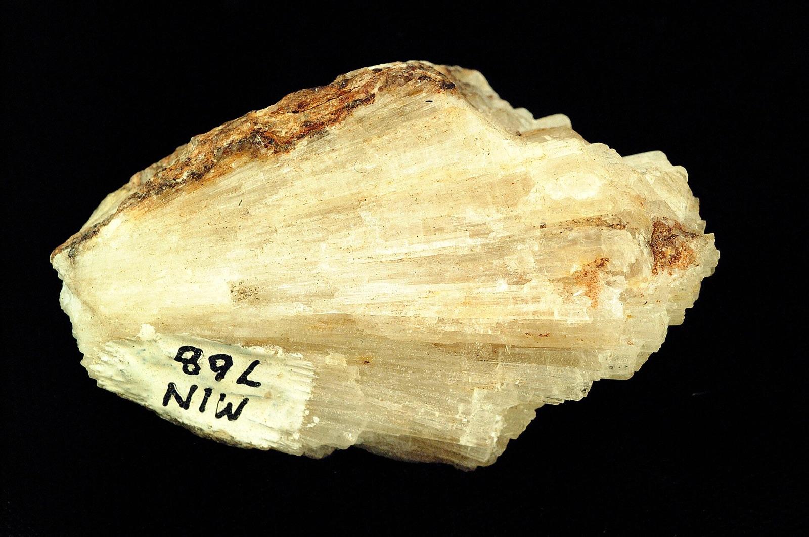 Bladed pale yellow strontianite specimen