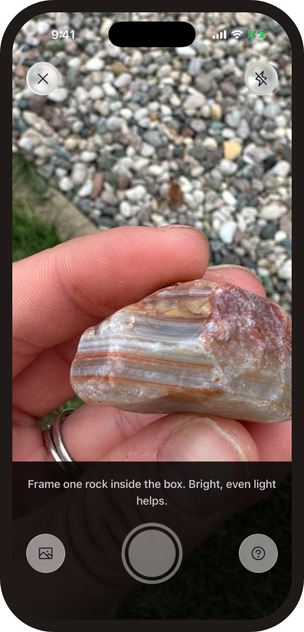 RockHoundR rock identifier camera pointing at a banded agate held in a hand